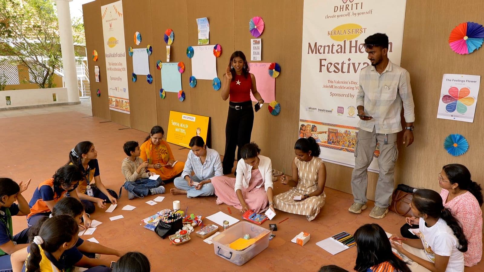 Sanjana working with a child